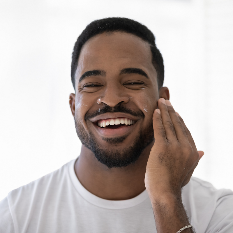 Eonian skincare for me, Soveregin skin balm for aftershave face care. Man applying aftershave cream